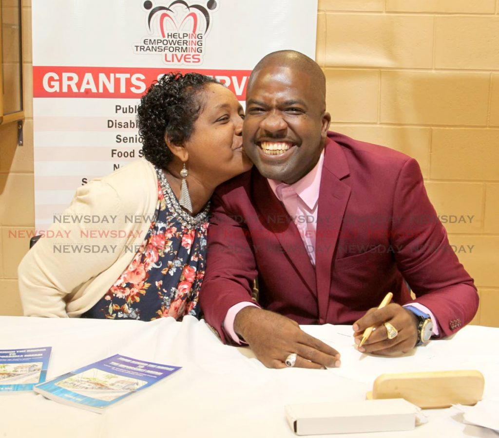 Akini Gill and his mother Elizabeth St Clair,
at the official book launch of 