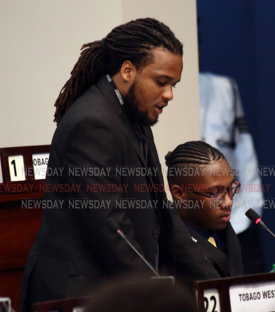 Youth prime minister Kris Miller, member from Belize, contributes to debate at the 15th Regional Youth Parliament Debate hosted by the  Parliament of TT at International Waterfront Centre, Port of Spain, on Wednesday. PHOTO SUREASH CHOLAI