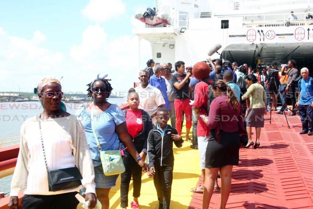 People disembark from the Jean de la Valette interisland ferry after it made its first commercial voyage from Scarborough to the Port of Spain.  Photo by Sureash Cholai