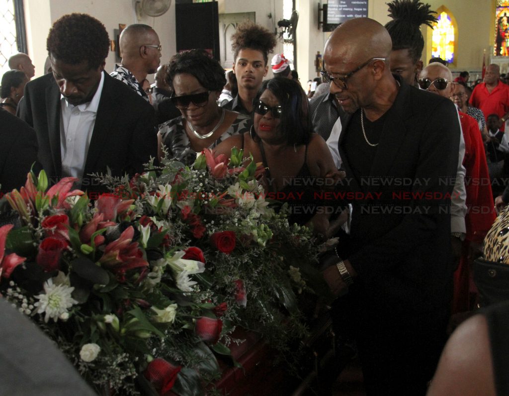 Family and friends of former TT mdoel Lystra Cudjoe at her funeral service which was held at the All Saints Anglican Church, Queen's Park Savannah West on Friday.

Photo: Ayanna Kinsale
