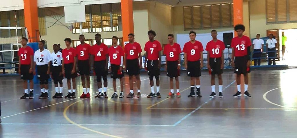 The TT Under-19 boys volleyball team prior to taking on Brabados, at the Caribbean Zonal Volleyball tournament, at St Catherine, Jamaica,yesterday.