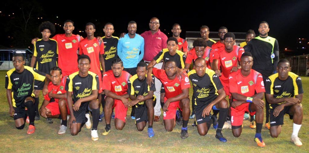 Players of Carenage All-Star XI and San Juan Jabloteh take a group picture before the start of the exhibition match at the launch of the 2019 BPTT Carenage All-Star Football League. Back row, centre, is Kyron Williams, president of the Friends and Family Community Group.