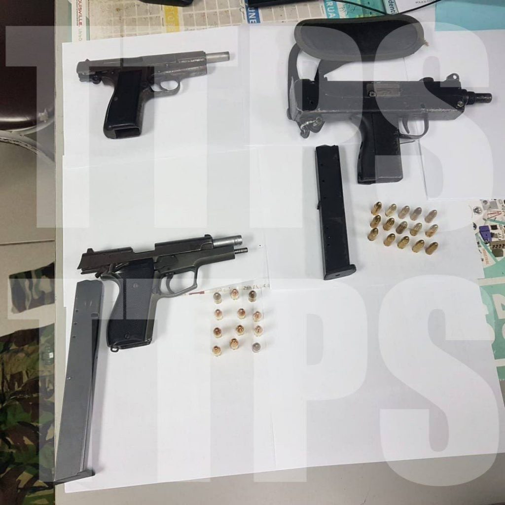 AN UZI and two pistols found in a police exercise held in Tunapuna, four people including a 15-year-old boy was held in relation to the discovery of the guns. 