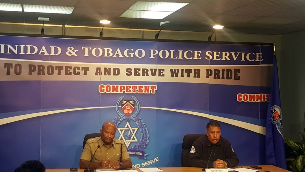 Acting Superintendent Wayne Mystar (left) and Commissioner of Police Gary Griffith at a police media briefing in Port of Spain on Wednesday morning. 