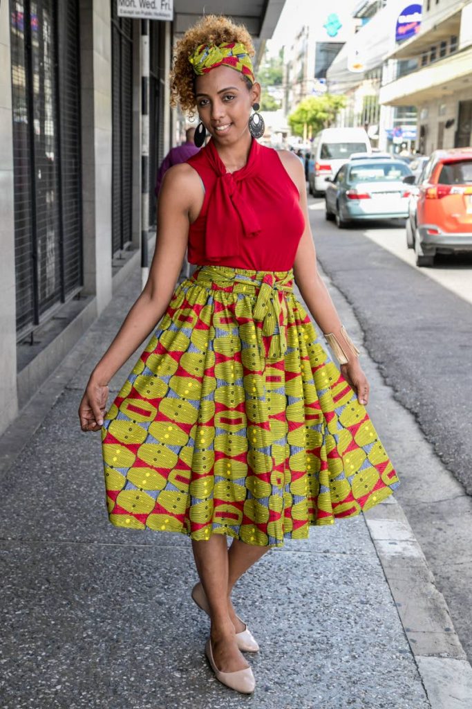 Charlene McCarthy from San Juan in her African clothing along Park Street Port of Spain. Photo by Jeff Mayers