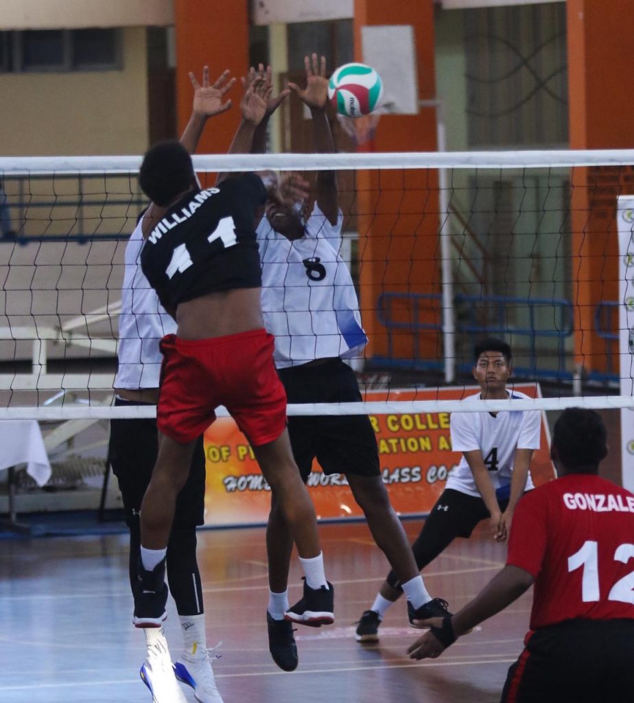 Captain Nicholas Williams spikes a ball against Suriname yesterday at the CAZOVA U19 Boys Championship, St. Catherine, Jamaica. Photo by Sherdon Pierre