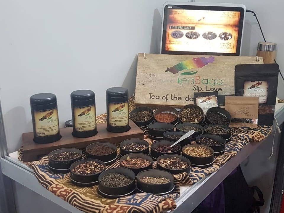 A TeaBago booth displays some of the ingredients used to make the teas. 