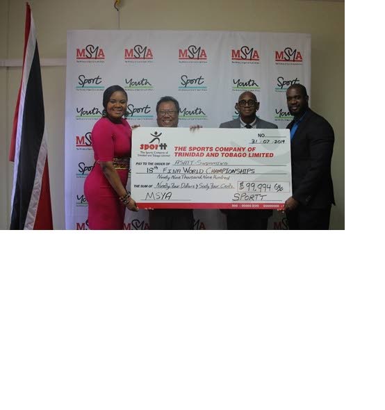 ASATT president Lindsay Gillette (second from left) collects a cheque from Sports Minister Shamfa Cudjoe (left), with Anthony Creed, executive manager at SPORTT (second from right) and Gabre Mc Tair, assistant director of Physical Education and Sport, looking on. PHOTO COURTESY MINISTRY OF SPORT AND YOUTH AFFAIRS