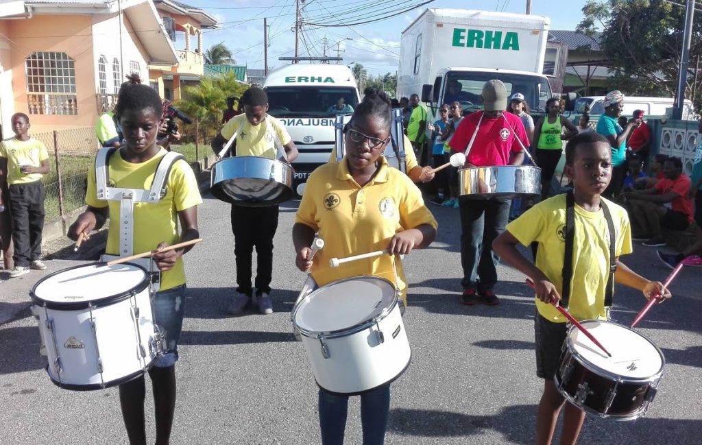 A marching band performed at the start of the Freedom Run 5K and Emancipation celebrations at Walke Street, Sangre Grande. PHOTO BY STEPHON NICHOLAS