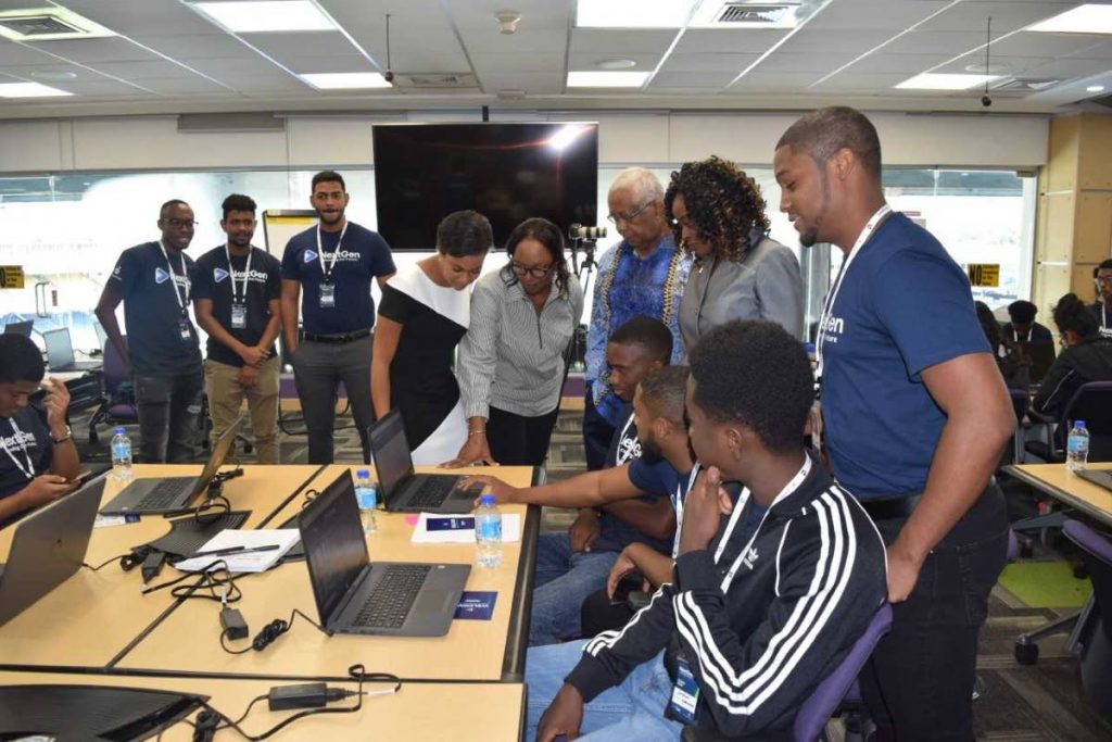Participants learn about ICT at the launch of the NextGen Tech Education Coding Camps hosted by BPTT at the Queen’s Park Oval, Port of Spain on August 3. Education Minister Anthony Garcia spoke at the event which is endorsed by the Education Ministry. PHOTO COURTESY MINISTRY OF EDUCATION