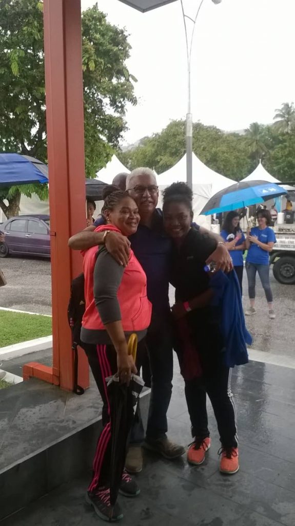 (From left) Laura Castellano, Health Minister Terrence Deyalsingh and Isabella Khan pose for a photo right before the TT Moves Breastfeeding Walk and Health Fair at Mt Hope's Women's Hospital on Saturday. PHOTO BY TENISHA SYLVESTER