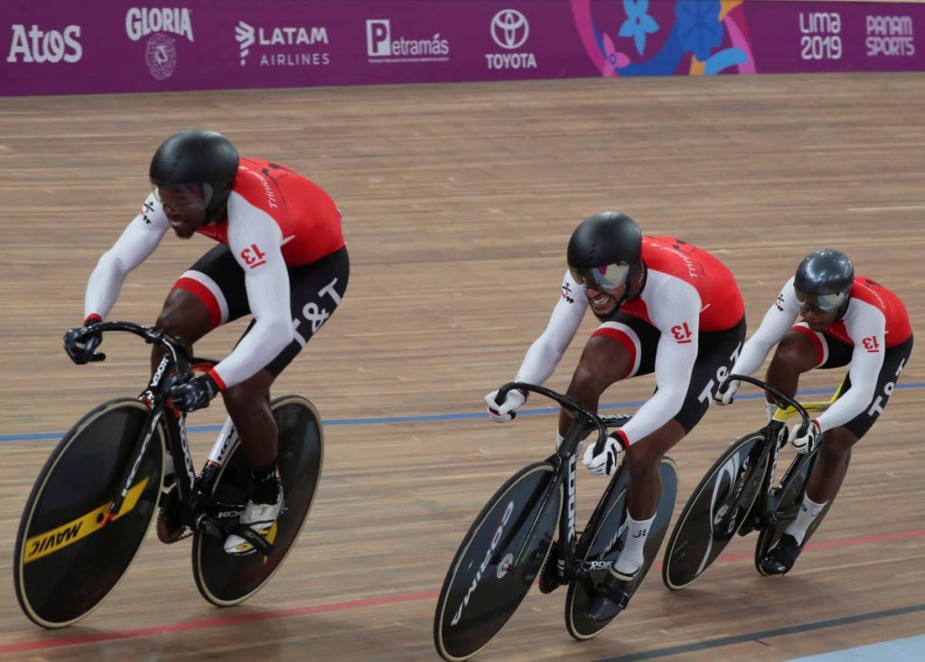 TT cyclists (from left) Keron Bramble, Njisane Phillip and Nicholas Paul compete in the men's team sprint qualifying round at the Pan American Games in Lima, Peru, Thursday. Phillip and Paul will battle in the individual men's sprint at 8.01 pm, tonight.