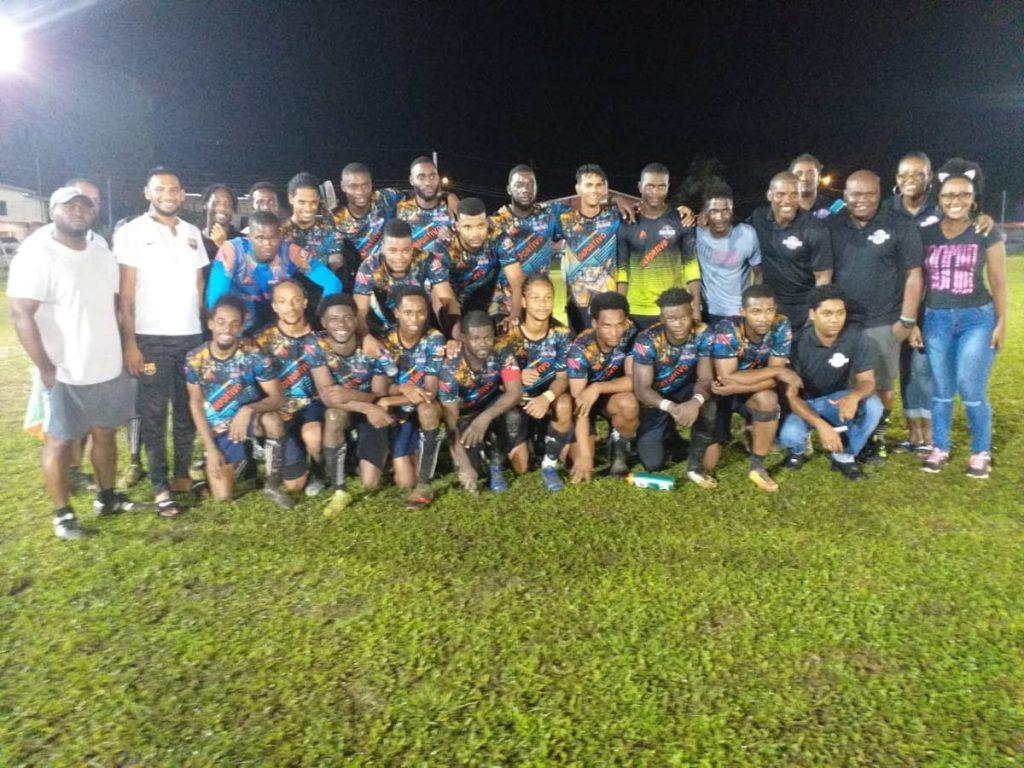 Members of the Deportivo Point Fortin team after Saturday’s victory.