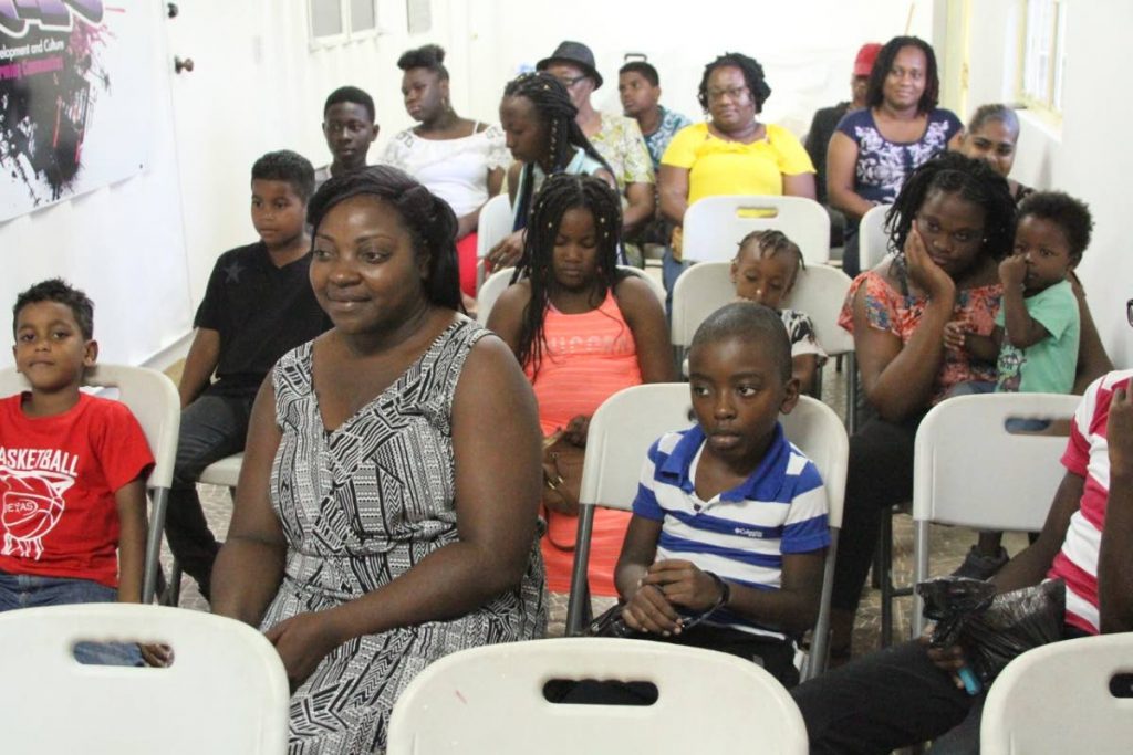 Attendees at the launch of the Mason Hall Police Youth Club literacy programme on August 2.