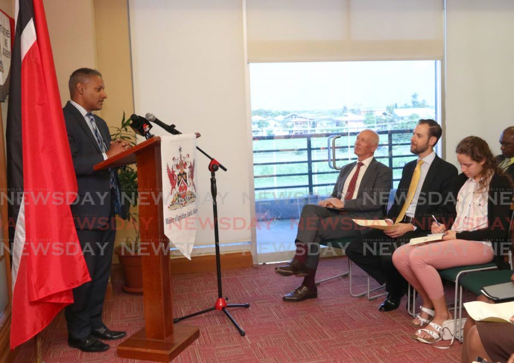 Minister of Agriculture, Lands and Fisheries Clarence Rambharat speaks at the ceremony for the signing of an MoU with five other ministries at his ministry in Chaguanas on Tuesday.   PHOTO BY MARVIN HAMILTON