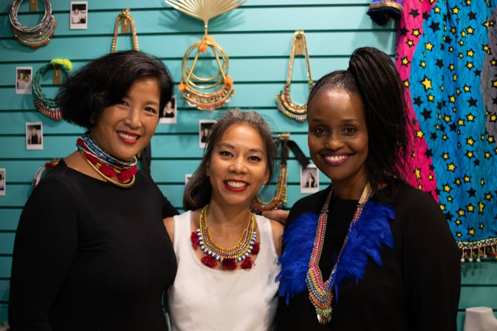 Nicole Akong centre, with friends, owner of Diamond Boulevard Gigi Morley and owner of B3 Wine and Spirits Donna Chin Lee.

Photo: Brendan Delzin