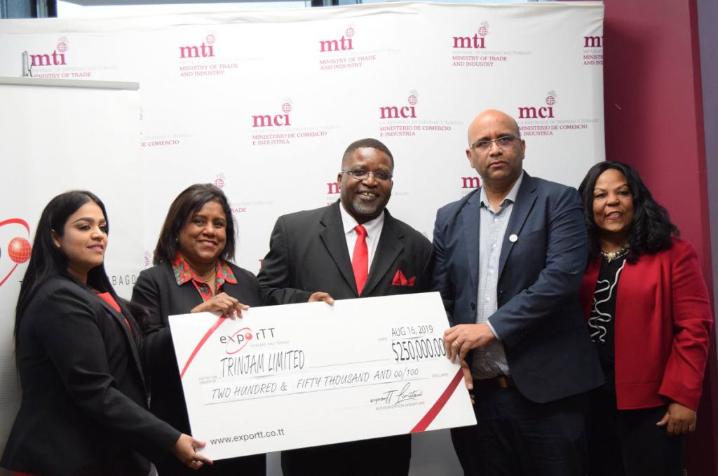  from left to right: Director,exporTT, Renuka Sagramsingh-Sooklal, Paula Gopee-Scoon, Micheal Nelson, Dietrich Guichard, ceo exporTT and Claudette Bridgewater, director of Trinjam Homefoods Ltd at the handing over of the Ministry of Trade and Industry Grant Funding Facility, at the ministry’s heaquarters, Port of Spain.