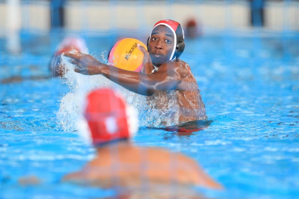 In this August 18 file photo, TT’s Everson Latchman shoots and scores the game tying penalty on Peru’s goalkeeper Ricardo Rodrigo Fuentes, during the UANA Waterpolo Youth Championship between Boys U17 TT and Peru, at the National Aquatic Centre, Couva. TT won 14-13.