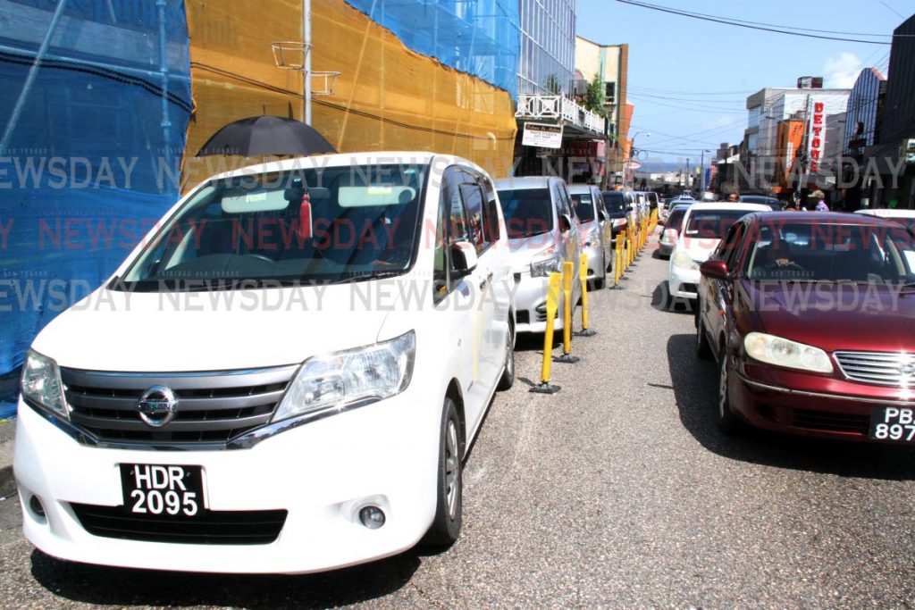 In this file photo, taxi drivers ply their trade on the Chaguanas Taxi stand on High Street, San Fernando.