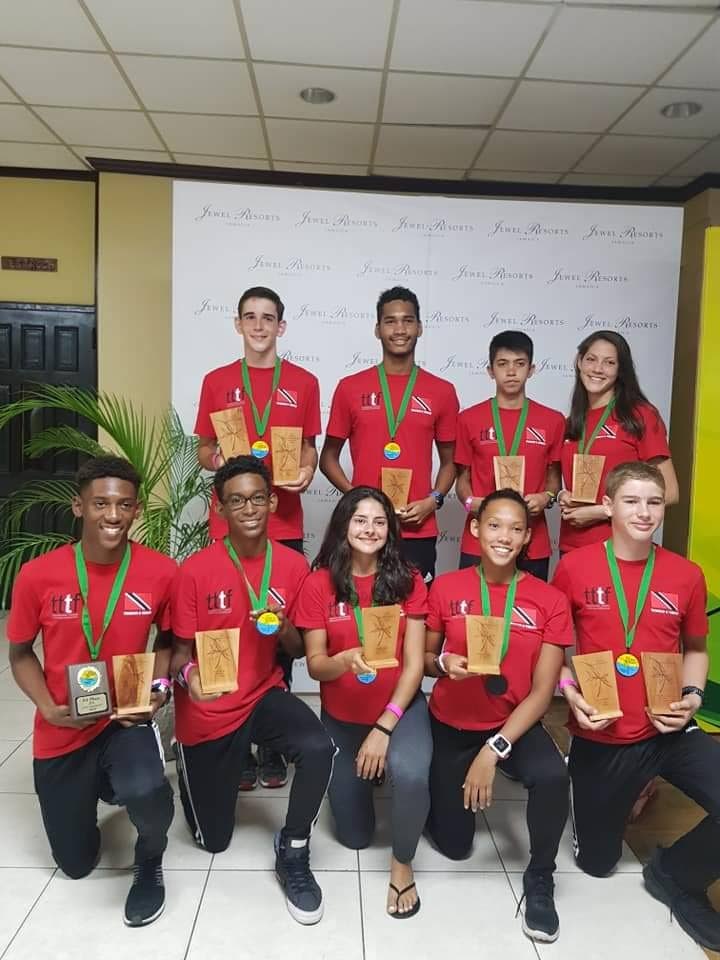TT athletes display their awards at the 2019 Carifta Triathlon and Aquathlon Championships in Jamaica. 