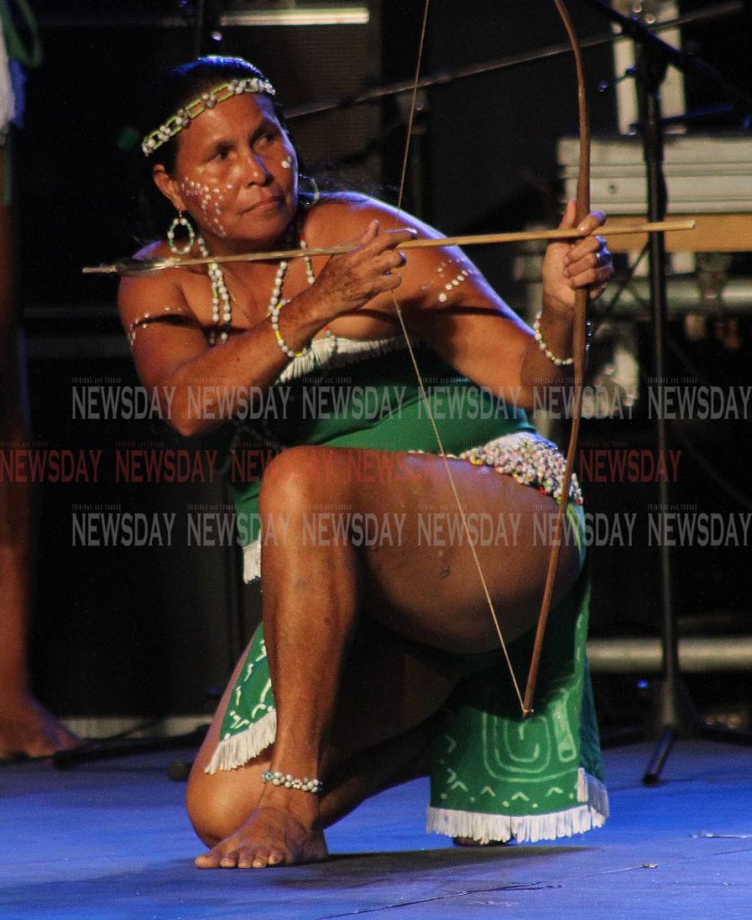 A Dominican dancer performs the Kalinago Dance  at CARIFESTA Country Night on Tuesday, QPS.