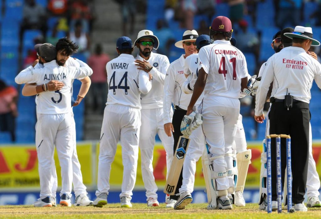 India celebrates winning on day 4 of the 1st Test between West Indies and India at Vivian Richards Cricket Stadium in North Sound, Antigua and Barbuda, on Sunday.