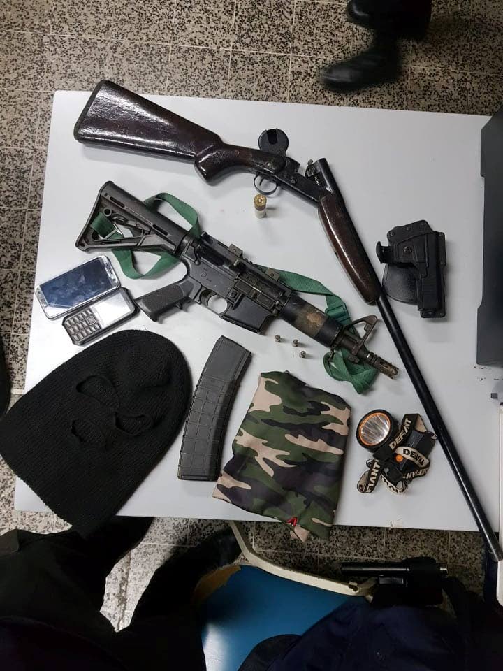 Various items seized from a makeshift camp off Cameron Road, Paramin, by police on Wednesday afternoon.    PHOTO COURTESY TTPS
