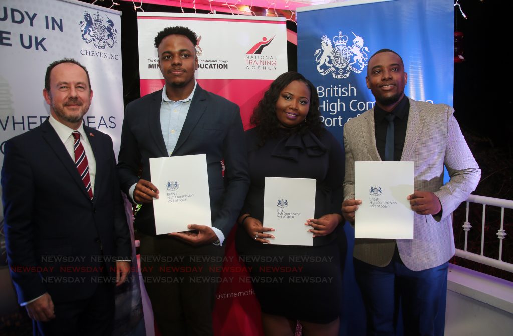 British High Commissioner Tim Stew left the recipients of the British Government's Chevening scholarship 2019/20  from next to Stew, Akil Callender,Asabi Rawlins and Carlon Mendoza during a ceremony at the Commissioner residence in Maraval on Thrsday night. 

PHOTO SUREASH CHOLAI