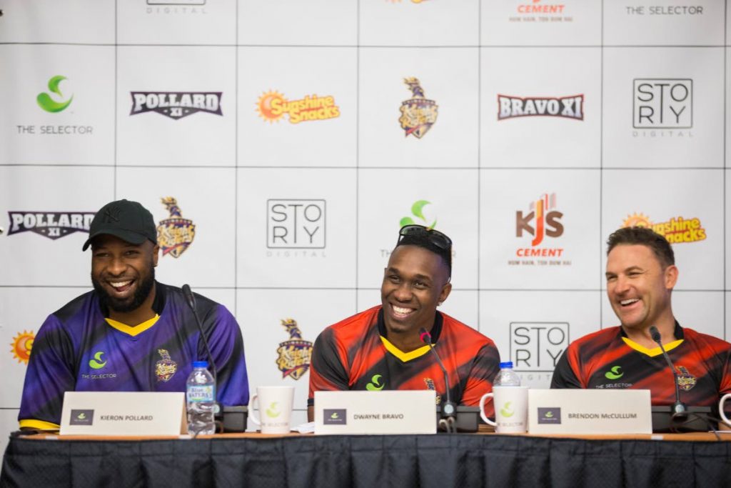 Trinbago Knight Riders captain Dwayne Bravo (centre), coach Brendon McCullum (right) and all-rounder Kieron Pollard during the media launch of 