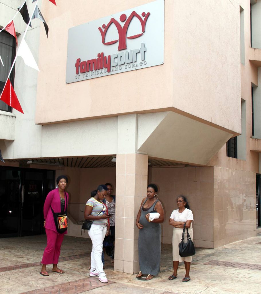 Members of the public wait at the Family Court, Port of Spain in this September 2015 file photo. There are plans to open a Family Court in Tobago. Lawyers however say a court should be opened in San Fernando because the demand for the service is greater in the southern city. FILE PHOTO