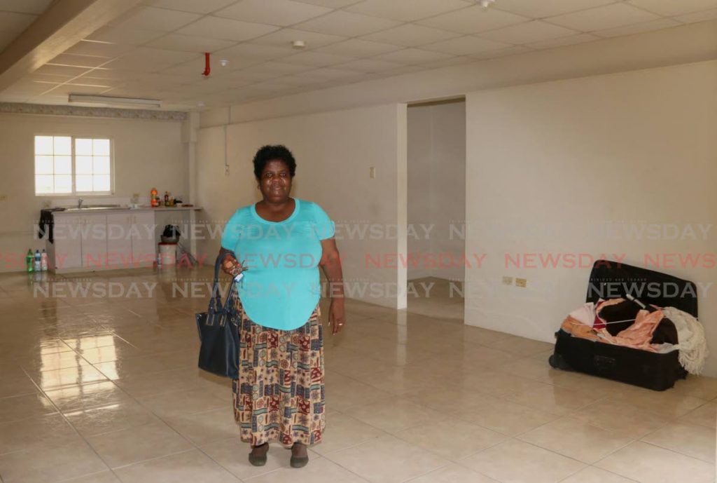 Zeia Flemming inside her apartment at Olera Heights, San Fernando. PHOTO BY MARVIN HAMILTON