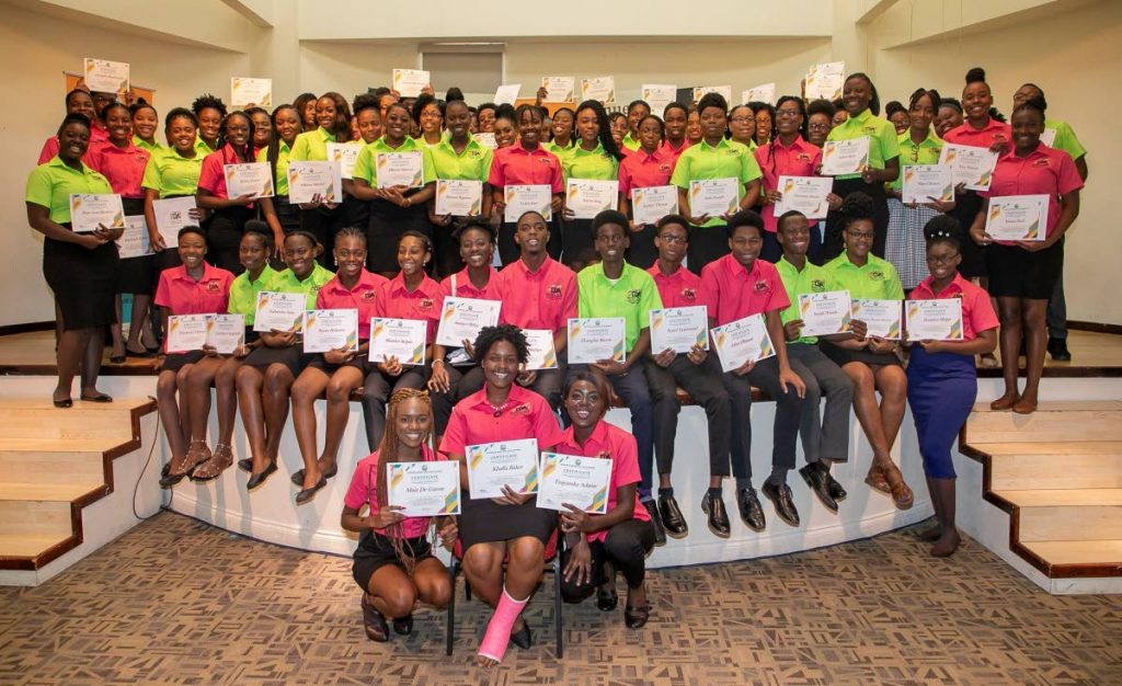 One hundred trainees from the World of Work programme with their certificates of participation from the 2019 programme. 