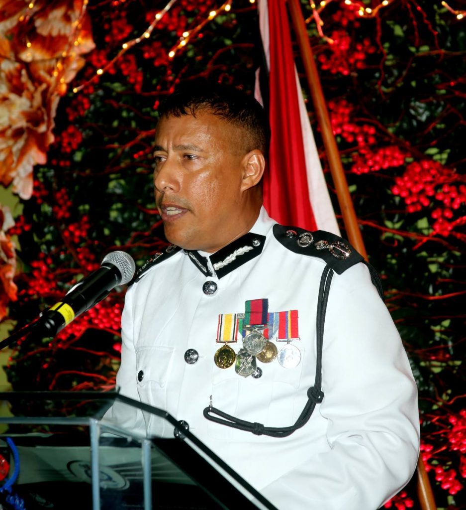 CoP's support: Police Commissioner Gary Griffith celebrates his officers during an Independence Day toast at Police Administration Building, Port of Spain yesterday. PHOTO BY SUREASH CHOLAI