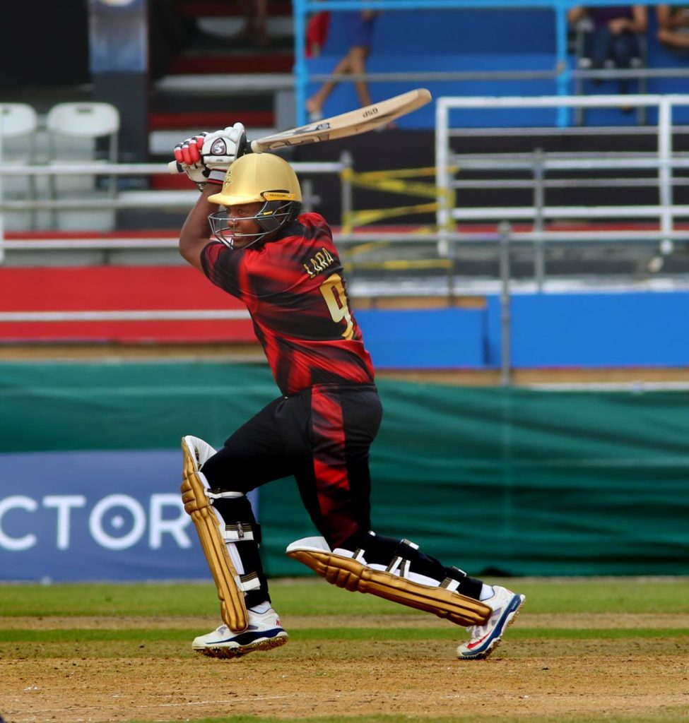 Brian Lara executes one of his trademark cover drives during yesterday's warm-up match. PHOTO BY SUREASH CHOLAI.