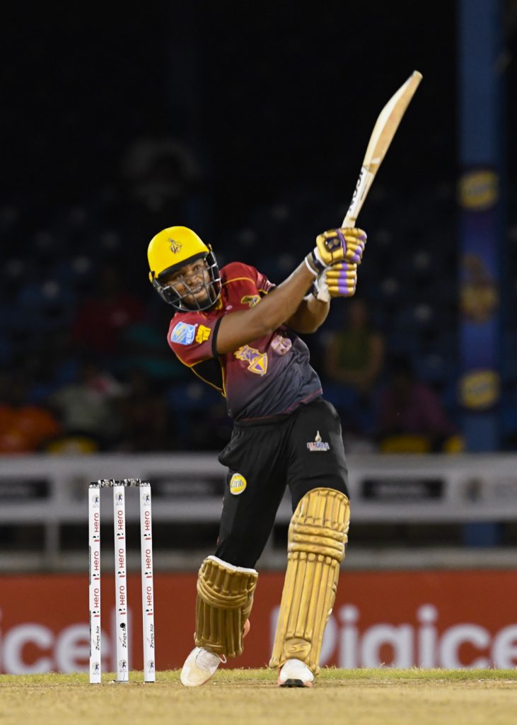 PORT OF SPAIN, TRINIDAD - AUGUST 07: In this handout image provided by CPL T20,  Javon Searles of Trinbago Knight Riders hits 6 during Match 6 of the 2017 Hero Caribbean Premier League between St Lucia Stars and Trinbago Knight Riders at Queen's Park Oval on August 06, 2017 in Port of Spain, Trinidad. (Photo by Randy Brooks - CPL T20 via Getty Images) *** Local Caption *** Javon Searles