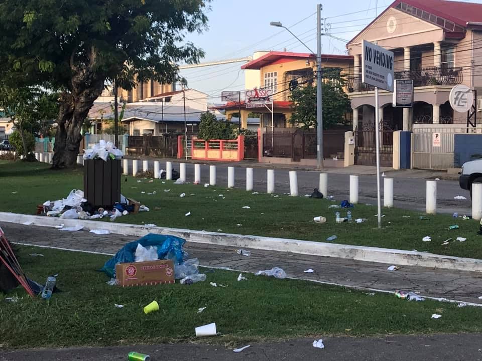 BEFORE: Garbage at Adam Smith Square, Woodbrook, on Sunday morning.