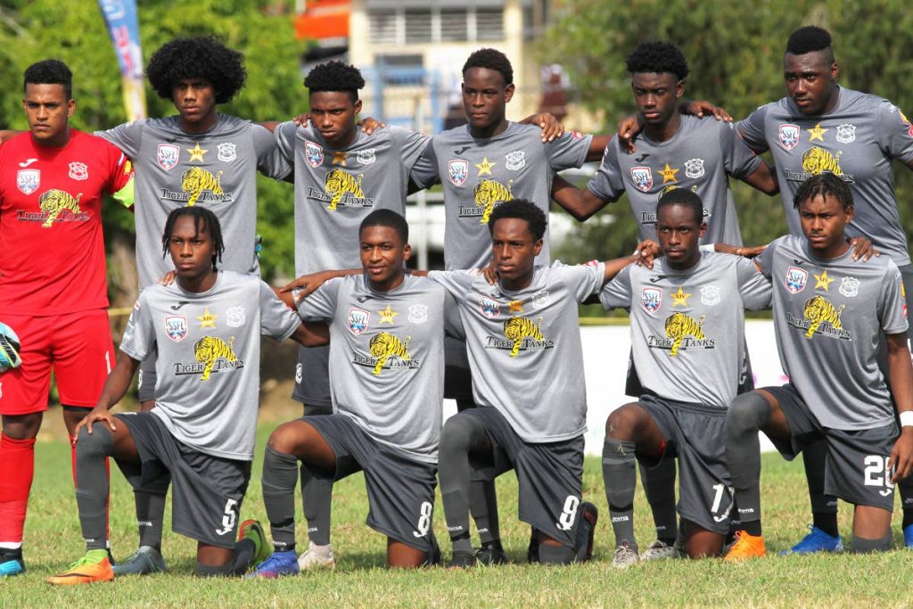 The Naparima College football team prior to their opening match in the 2019 Secondary Schools Football League against St Mary’s, at Lewis Street,San Fernando, on Wednesday. 