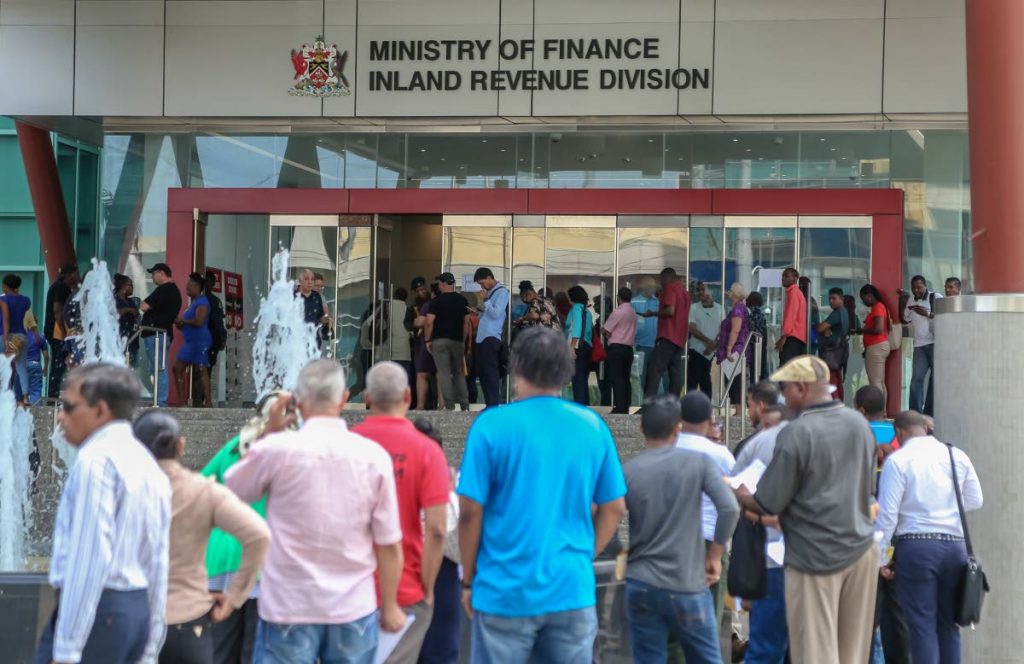 Long lines were the order of the day on Friday as hundreds rushed to pay their taxes at the Government Campus in Port of Spain on the last  working day of the three-month tax amnesty. 