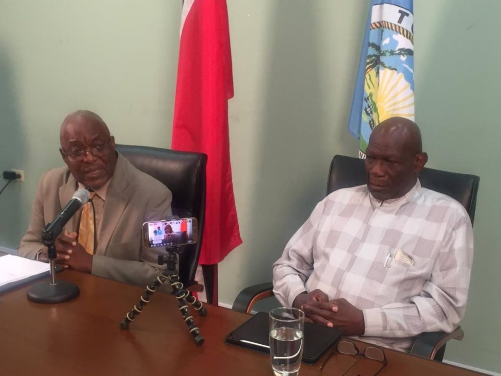 Chief Secretary Kelvin Charles, left, and head of the Airport Relocation Committee Allan Richards at a press conference on Tuesday. 