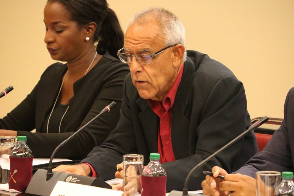 ANSWERING: Douglas Camacho, chairman of the Sports Company responds to a question yesterday during a meeting of the Public Administration and Appropriation Committee at the Parliament Building in Port of Spain. PHOTO COURTESY TT PARLIAMENT