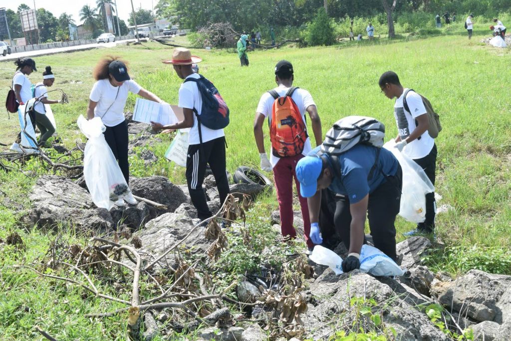 File Photo: Volunteers collect garbage on the Foreshore, Audrey Jeffers Highway as part of the International Coastal Cleanup campaign in 2019.