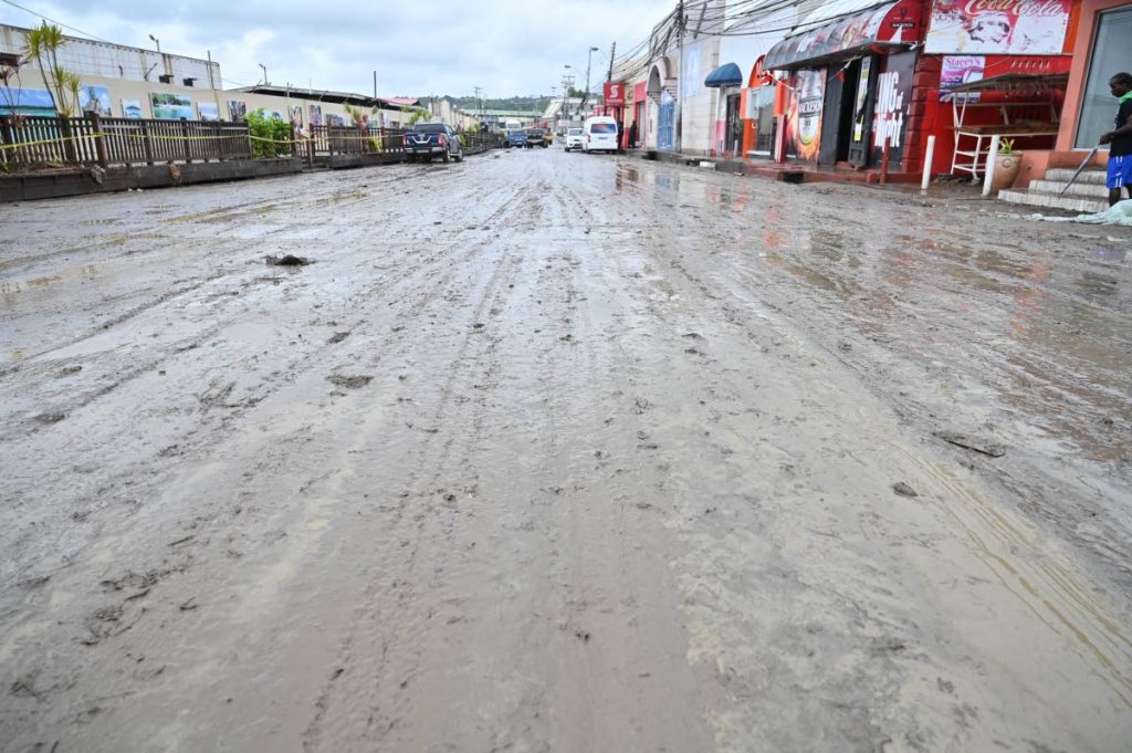 SEA OF MUD: The main road in downtown Scarborough was a sea of thick mud yesterday after floodwaters subsided following the passage of Tropical Storm Karen.