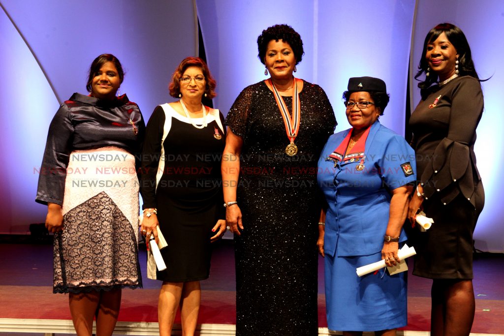 Her Excellency Paula-Mae Weekes, President, alongside recipients of the Medal for the Development of Women's Rights and Issues in Trinidad and Tobago,
Ms. Marilyn Barker-Duncan, Ms. Onika Mars, Professor Patricia Mohammed and Asiya Mohammed,
at the 50th annual National Awards ceremony, 
Lord Kitchener Auditorium, NAPA.
Port of Spain,
Tuesday, September 25, 2019. PHOTO BY ROGER JACOB. 