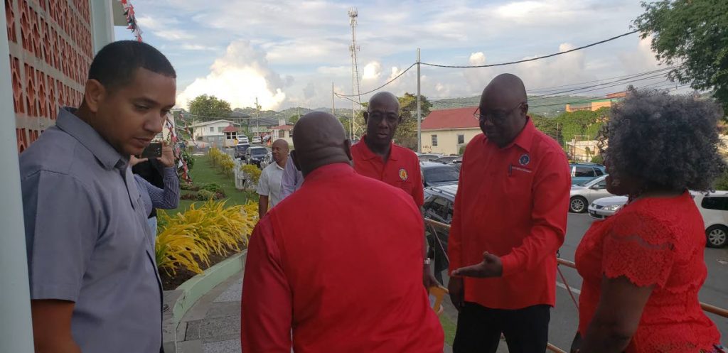 In this September 2018 file photo, Prime Minister Dr Keith Rowley, centre, is greeted by Chief Secretary Kelvin Charles, right, as he arrives at the  PNM Tobago Council’s convention at Shaw Park. This year's convention takes place today in Mt Marie.