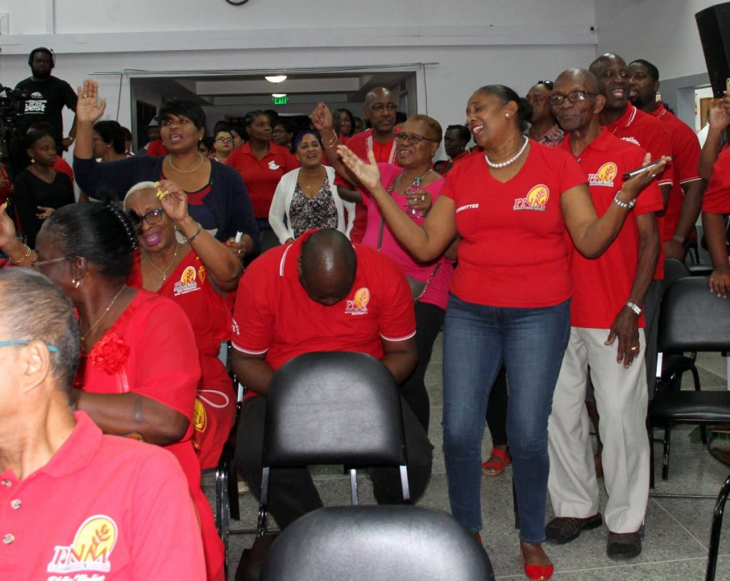 PNM supporters in an upbeat mood during a political meeting in Pleasantville in July. FILE PHOTO