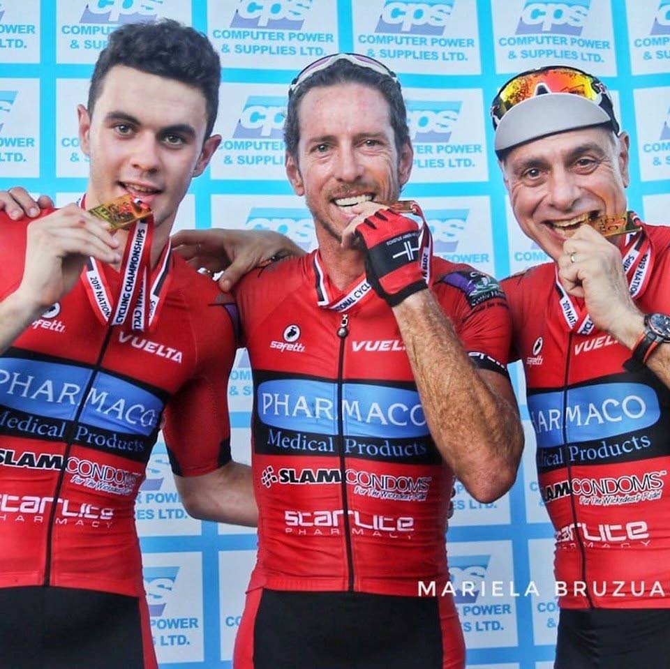 Team Pharmaco's National Criterium Championship winners, Emile Abraham (Elite Men), centre, Enrique De Comarmond (Juniors), left, and Stephen Aboud (Men's 60-69).  Abraham is hoping to use this year's Tobago  International Cycling Classic as opportunity to assist up and coming road racers. 