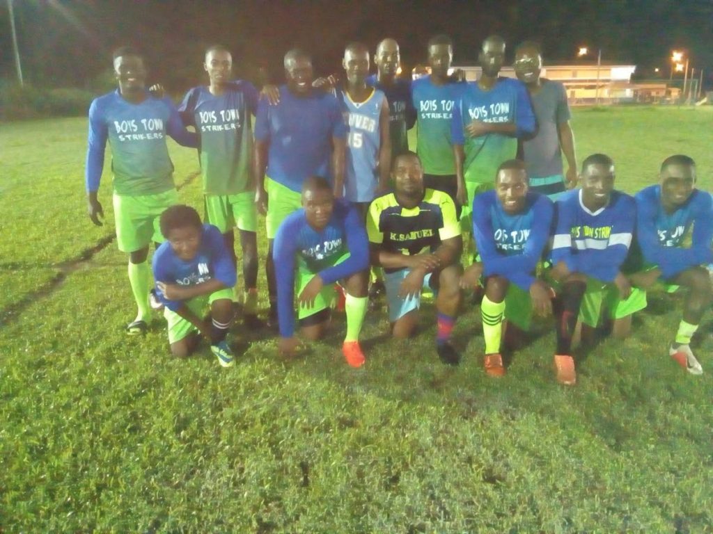 Boys Town players and management after a recent win in the Fishing Pond Football League.