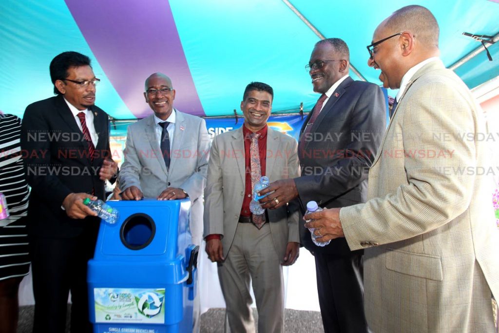 Minister of Rural development  and Local government Haji Kazim Hosein, Minister of Public utilities Robert Le Hunte, chairman of the Siparia Regional Corporation Dr Glen Ramadharsingh and managing director  of the EMA, Hayden Romano at the Siparia Regional corporation recycling campaign launch at Irwin park Siparia. Photo by Lincoln Holder