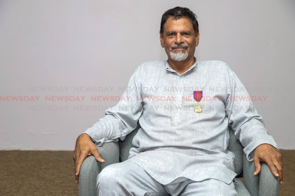 Shastri Maharaj, at Newsday's Port of Spain office, says receiving the Public Service Medal of Merit (Gold) award feels like his 40-year career as an artist is 