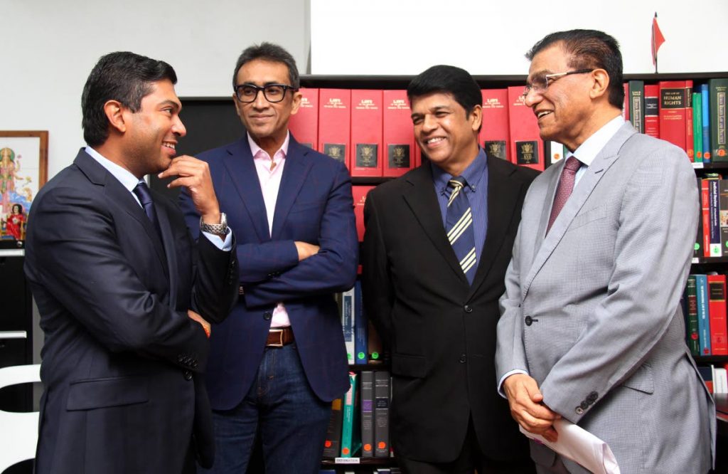 Senior counsel Ramesh Lawerence Maharaj, right, with the team of lawyers for A&V Drilling Ltd, from left, Michael Rooplal, Jagdeo Singh  and Prakash Ramadhar at Maharaj’s chambers in San Fernando yesterday. PHOTO BY VASHTI SINGH